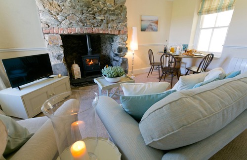 Ty Croes Apartment | Bodwarren - a ground floor bedroom that sleeps 4 guests in 2 bedrooms