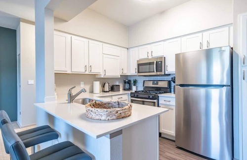 McNeil Apartment | Boulevard Stays Peaceful 1BR King Suite Pool, Parking Gym 02