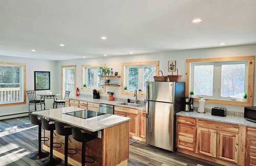 Moretown House | Brand new family home nestled in the woods close to Waterbury, Stowe, and Sugarbush with a hot tub