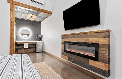Hill City Hotel | Brand New Motel! Fireplace - Concrete Floors - Live Edge Trim - Vaulted Ceilings