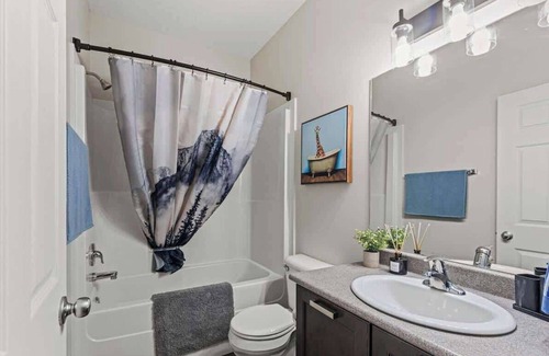 Grande Prairie Apartment | Bright & Airy Suite | Free WIFI | Smart TV & More
