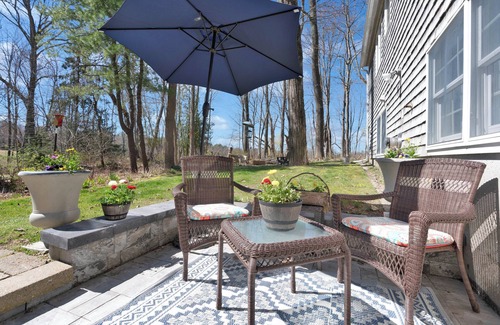 Kennebunkport Apartment | Bright and inviting Kennebunkport apartment, steps from downtown happenings Private backyard