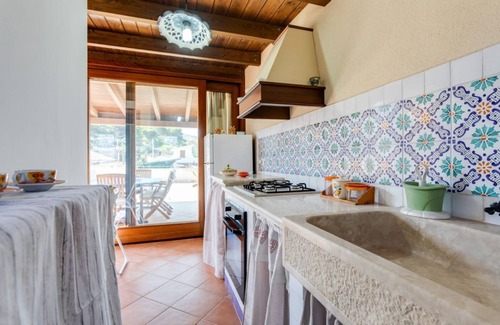 Custonaci Apartment | Bright and welcoming 35sqm apartment located on the first floor of an independent villa in Custonaci, a quiet countryside location a short distance from Erice and Cornino! The apartment has a large terrace with outdoor furniture and is completely indepen