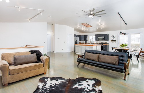 Northeast Anchorage House | Bright modern home with private hot tub, fireplace, enclosed yard, & WiFi
