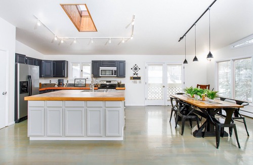 Northeast Anchorage House | Bright modern home with private hot tub, fireplace, enclosed yard, & WiFi