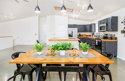 Northeast Anchorage House | Bright modern home with private hot tub, fireplace, enclosed yard, & WiFi