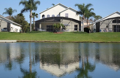 Lake Berkley Villa | BrightwaterVilla. Lake view, west facing extra large pool deck, lanai, hot tub