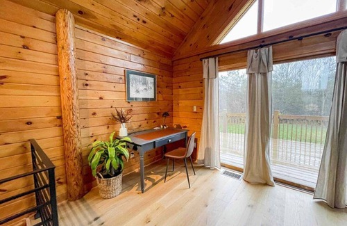 Wales Center House | Bring family and friends to this beautiful, spacious, open plan log home.