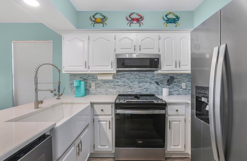 Gulf Shores House | Bring the Pup! Steps to Beach, Dining & Shops, 3 Sunny Balconies, Cozy Firepit!