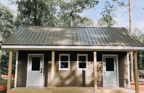 Hartwell RV Rental | Cabin #10: One bedroom with kitchenette and a large gravel parking pad beside the cabin for easy boat or trailer storage.