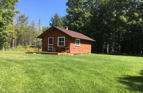 Rapid River Cabin | Cabin on lake with sauna - pets ok. Kayaks and boat provided.