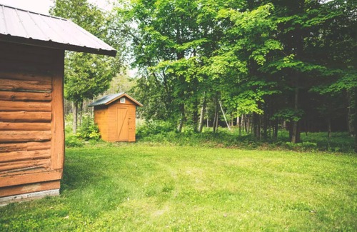Rapid River Cabin | Cabin on lake with sauna - pets ok. Kayaks and boat provided.