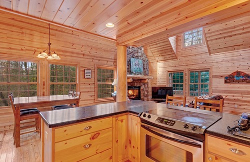 Saugatuck Cabin | Cabin tucked in the trees with private hot tub & lake/pool access