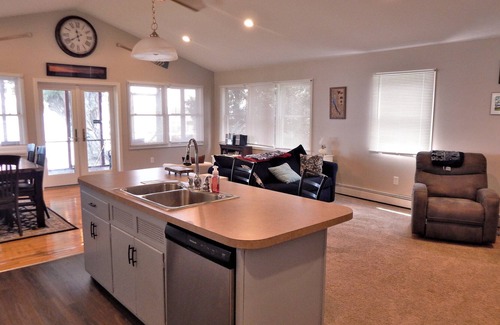Seneca Falls House | Calm on Cayuga. Lakefront home on Cayuga Lake with dock and screened in porch