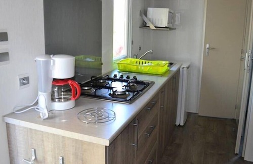 Gourdon House | Camping Paradis Domaine Le Quercy**** - Mobile Home 4 rooms 5 people + 1 child semi-covered terrace