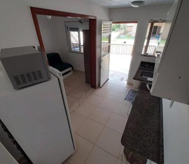 Barra de Ibiraquera Apartment | Cantinho da Barra