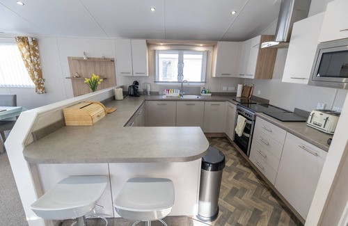 Mudeford House | 'Captain's Lodge' - a luxury lodge by the beach on Sandhills Holiday Park, Mudeford