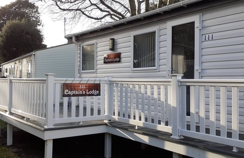 Mudeford House | 'Captain's Lodge' - a luxury lodge by the beach on Sandhills Holiday Park, Mudeford