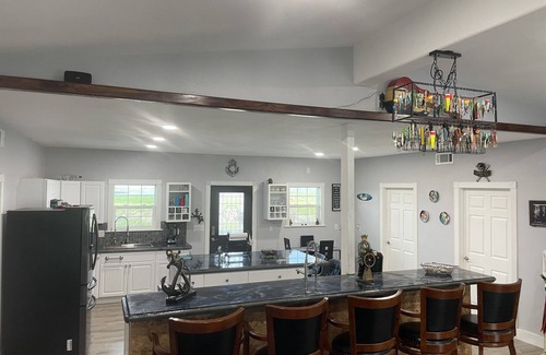 City-by-the Sea House | Captains Quarter/canal front, private pool, dock for two boats.