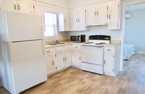 Nags Head Apartment | Captains Quarters, Less than 1 block to the beach!Covered Porch, Full Kitchen