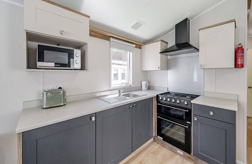 Longridge House | Caravan with one double and two twin.