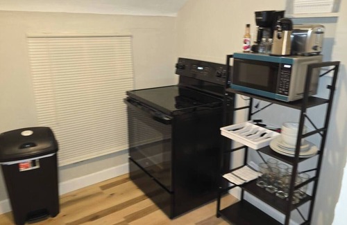 Fayette Condo | Carriage House by CMU - Upper Condo - Kitchen, King Bed, 65" TV Fast WiFi & AC