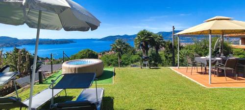 Cargiago Apartment | Casa 24 - Trilocale con Vista Lago, Giardino e Idromassaggio Gonfiabile