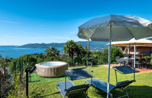 Cargiago Apartment | Casa 24 - Trilocale con Vista Lago, Giardino e Idromassaggio Gonfiabile