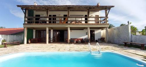 Taiba House | Casa Jangada - Incrível vista mar com Piscina e a melhor localização na Beira Mar da Taíba