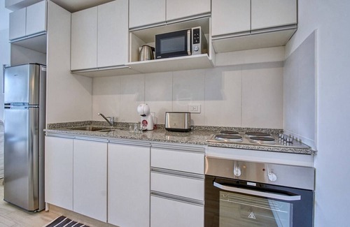 Constitucion Apartment | Cedrón Amazing Pool View Apartment