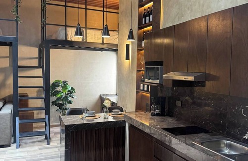 Monterrey Apartment | Centrally located and modern loft with unique charm.