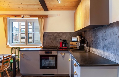 Farchant Ski Chalet | Chalet Rauschn with mountain view with whirlpool, shared sauna, terrace, balcony.