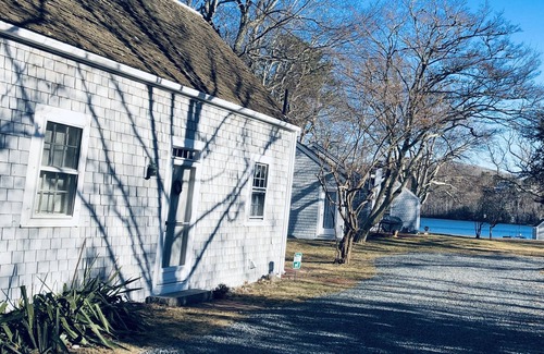Dennis Cottage | Charming 18th century cottage with its own beachfront on Scargo Lake near bay