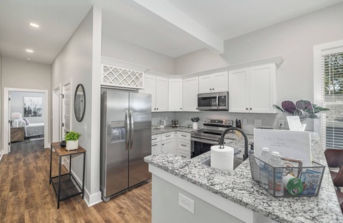 Fuquay-Varina Condo | Charming 1910 Luxury Condo in Downtown Fuquay - Steps to Parks & Eateries