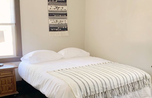 Victory Apartment | Charming 1920s 2bd Apartment in Convenient Location for Monthly+ Stays