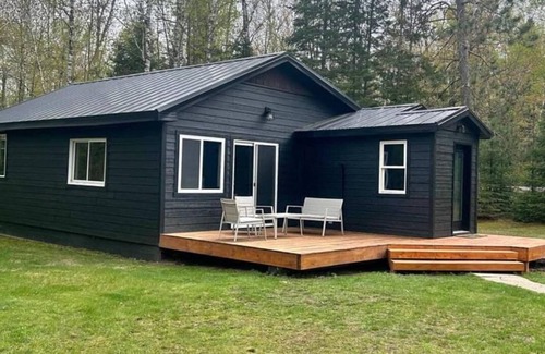 Grand Rapids Cabin | Charming 2-bed cabin one mile from public landing on Lake Pokegema w/Hot Tub