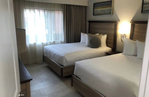 West Kissimmee Hotel | Charming 2-bedroom hotel with fitness room and AC in Kissimmee 1M from disney