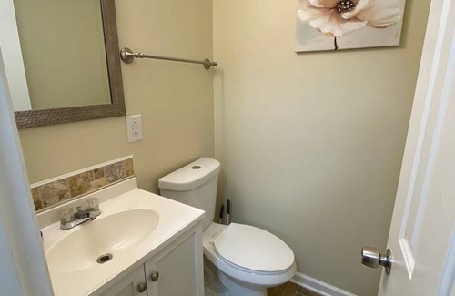 Downtown Greensboro House | Charming 2-bedroom townhome with WiFi, AC in Greensboro Big screen Smart TVs