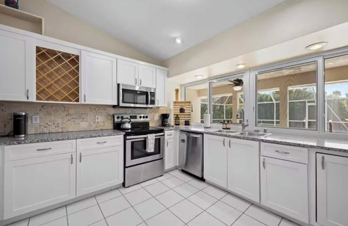 Port Saint Lucie House | Charming 3-bed house in Port St. Lucie with pool on the canal connected to ocean