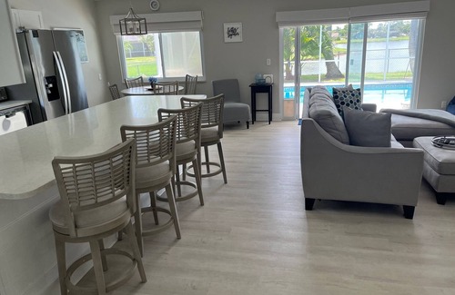 Jupiter Village House | Charming 3-bedroom pool home on the lake with spectacular sunsets & close to all