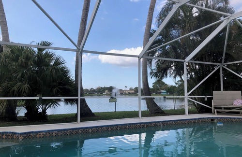 Jupiter Village House | Charming 3-bedroom pool home on the lake with spectacular sunsets & close to all