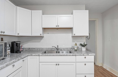 Battle Creek Apartment | Charming 3-bedroom apartment with AC - Walking Distance to Downtown!