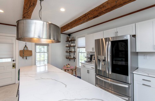 Village of Pewaukee House | Charming 4-bedroom house steps from Pewaukee Lake Beach, shops & restaurants