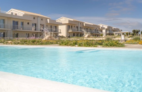Pachino Apartment | Charming 75 sqm seaview apartment on two levels, for 5 people, located inside the renowned Borgo 84 residence, equipped with swimming pool and cycle path. The property is located just 3 km from the center of Marzamemi, one of the most fascinating seaside