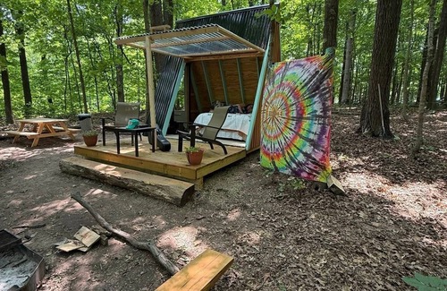 Janesville Cabin | Charming A-frame cabin set in the woods overlooking deep wooded ravines.