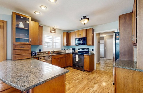 McCall House | Charming and spacious country home with furnished back deck and mountain view