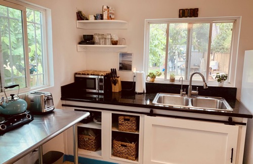 Leucadia Cottage | Charming beach cottage in a beautiful garden setting.