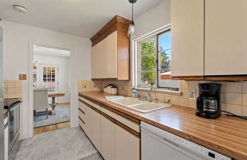 Cheyenne House | Charming brick home in The Avenues just a few blocks to Frontier Park.