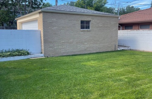 Cheyenne House | Charming brick home in The Avenues just a few blocks to Frontier Park.