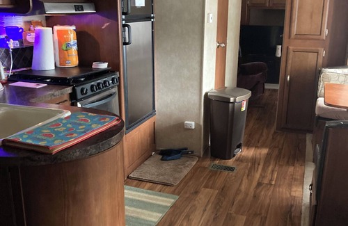Greenbush RV Rental | Charming camper within Trails End ChinoteagueBay Resort in Horntown VA